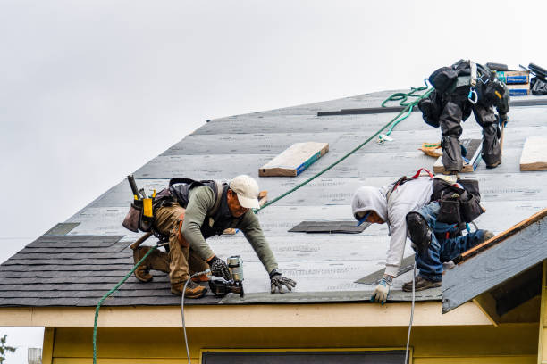 Professional Roof Replacement technician working in Cambridge City, IN